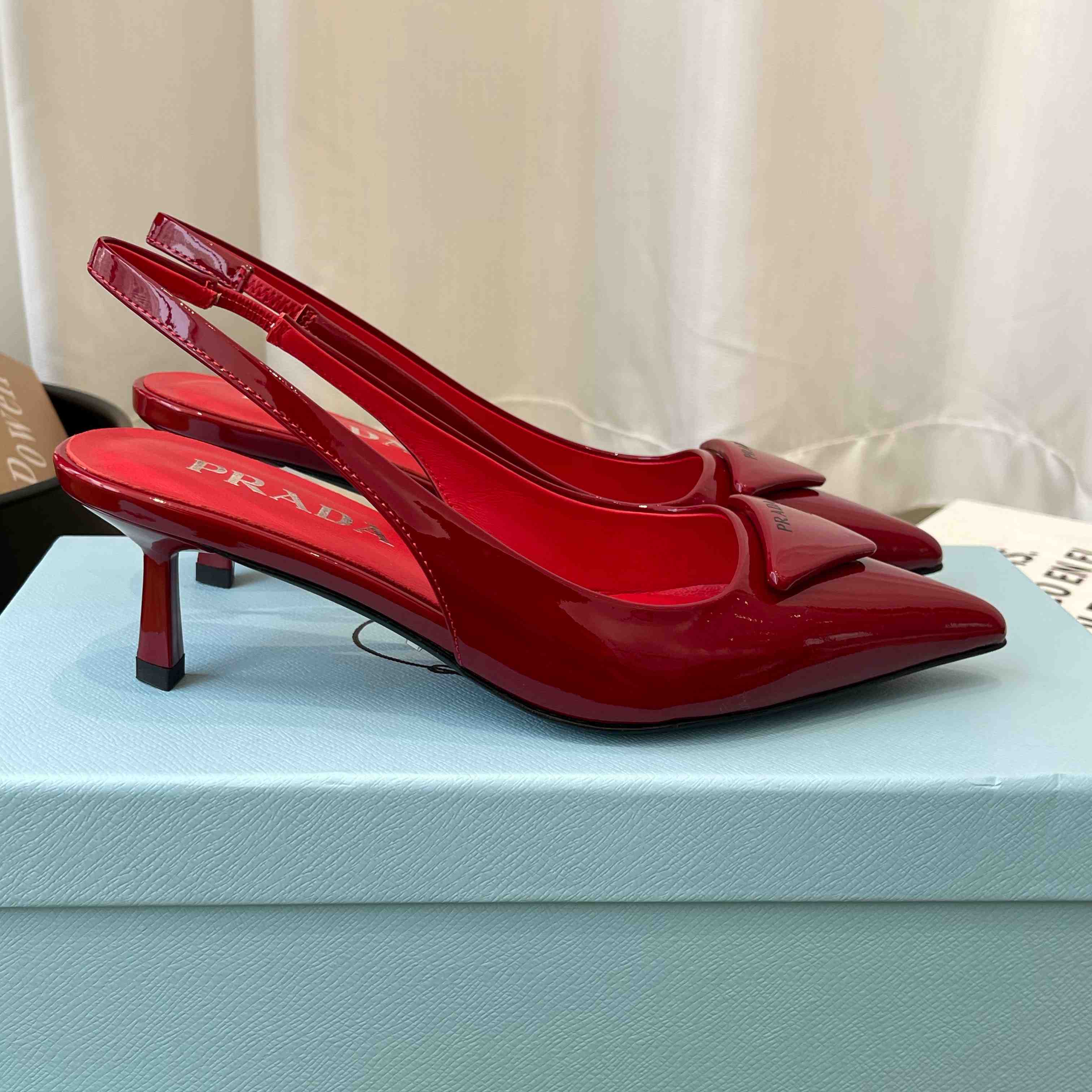Prada Patent Leather Slingback Pumps - FashionPlug