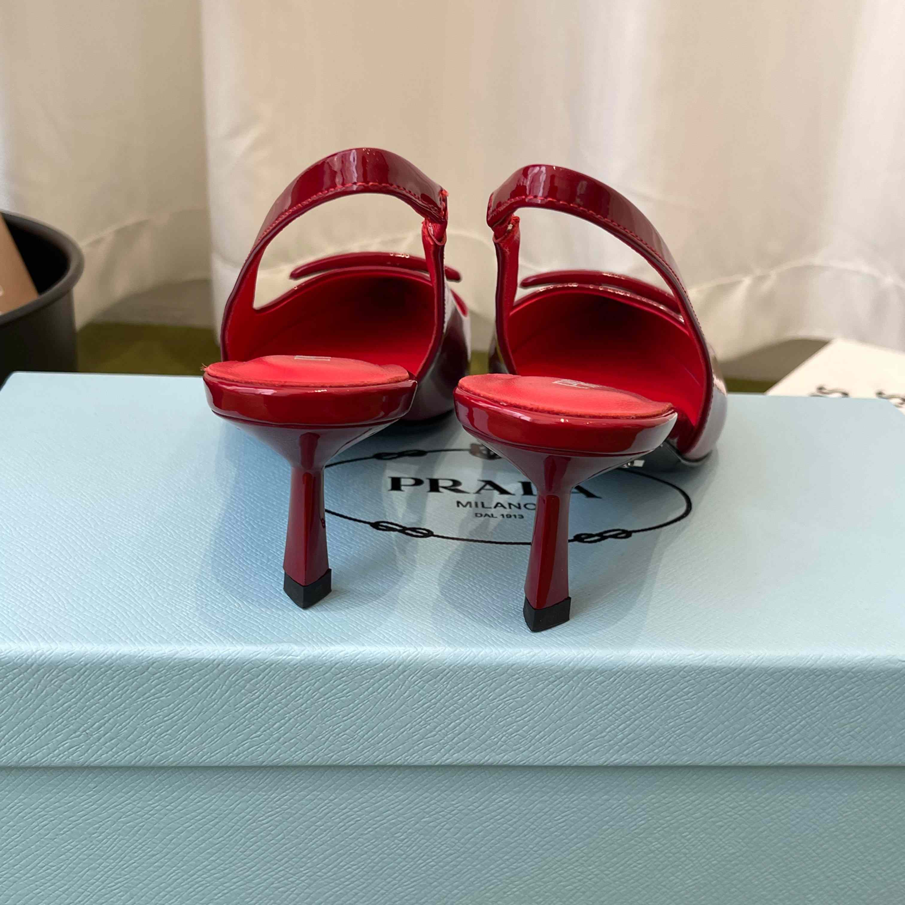 Prada Patent Leather Slingback Pumps - FashionPlug