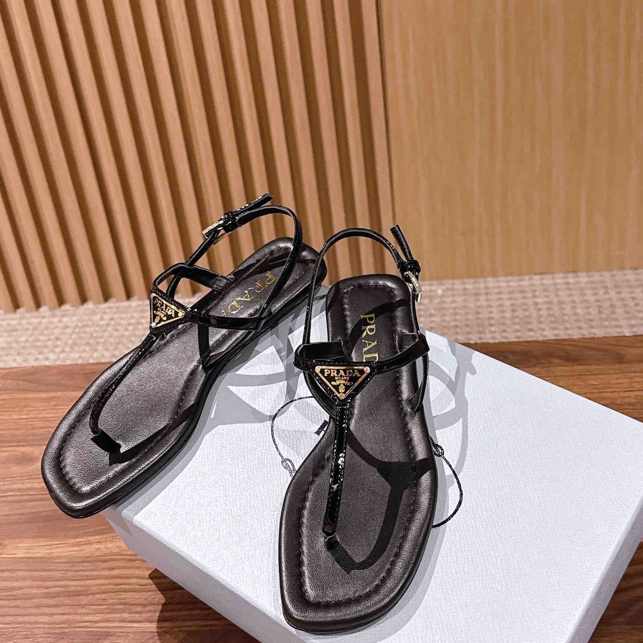 Prada Patent Leather Thong Sandals - FashionPlug