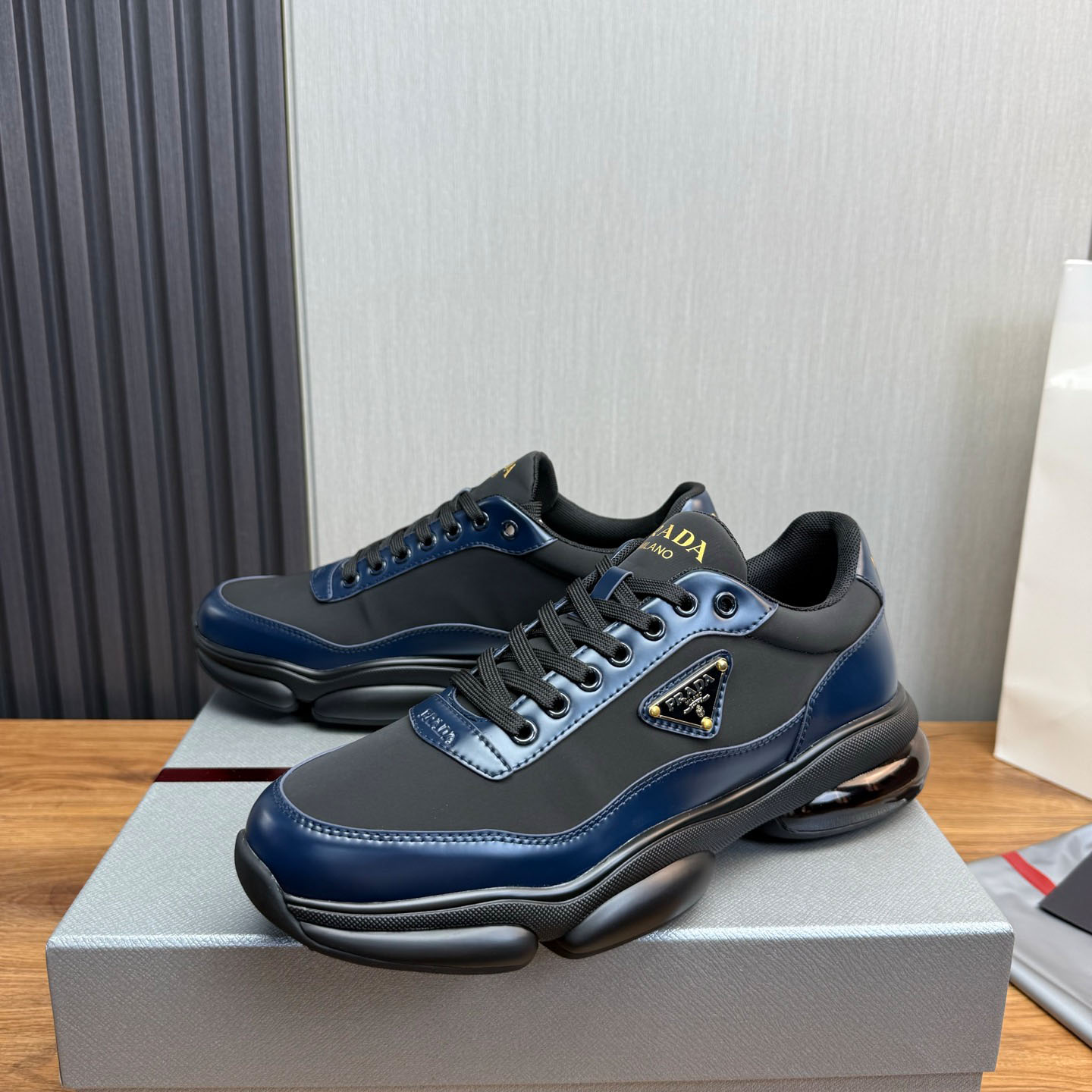 Prada Leather Sneakers - FashionPlug