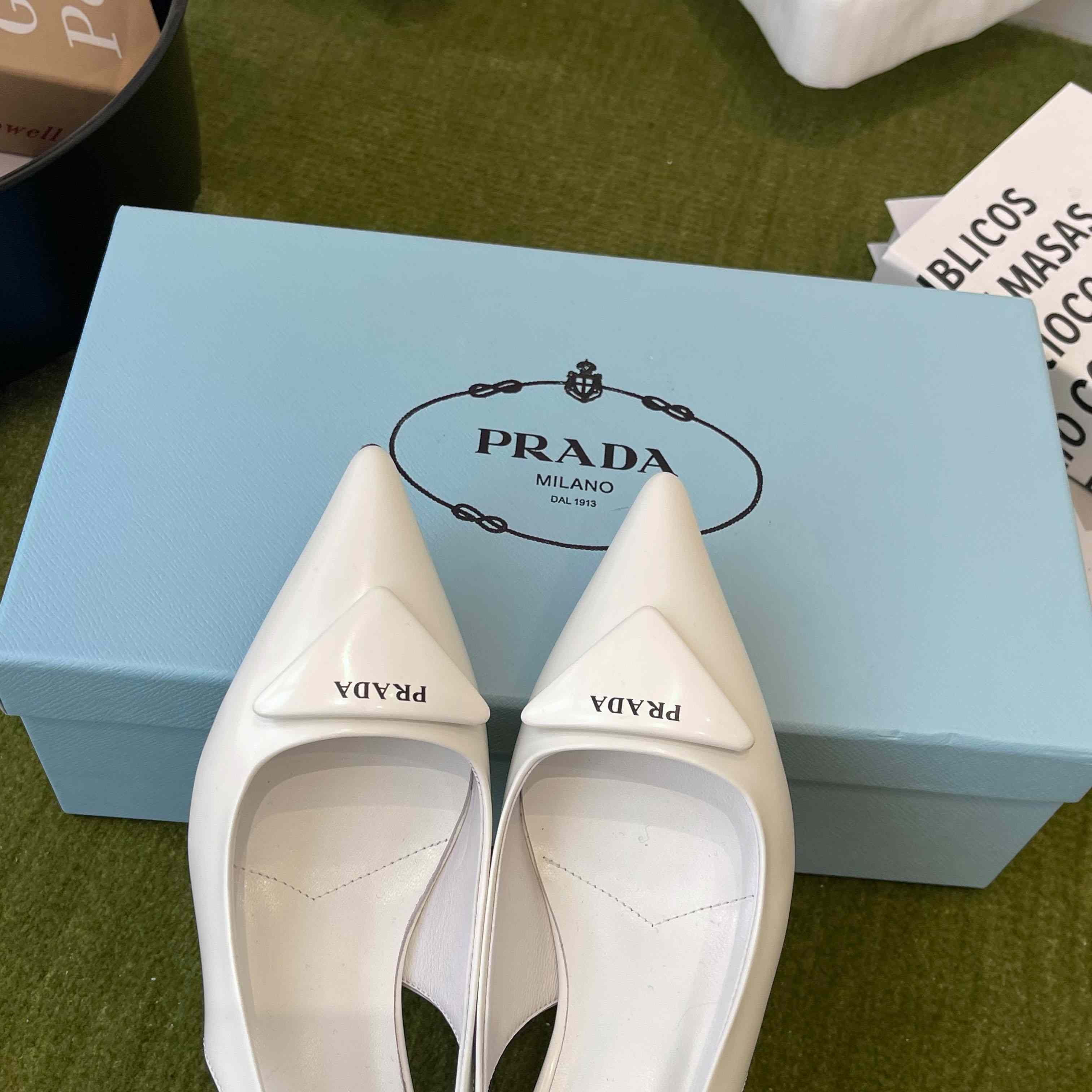 Prada Patent Leather Slingback Pumps - FashionPlug