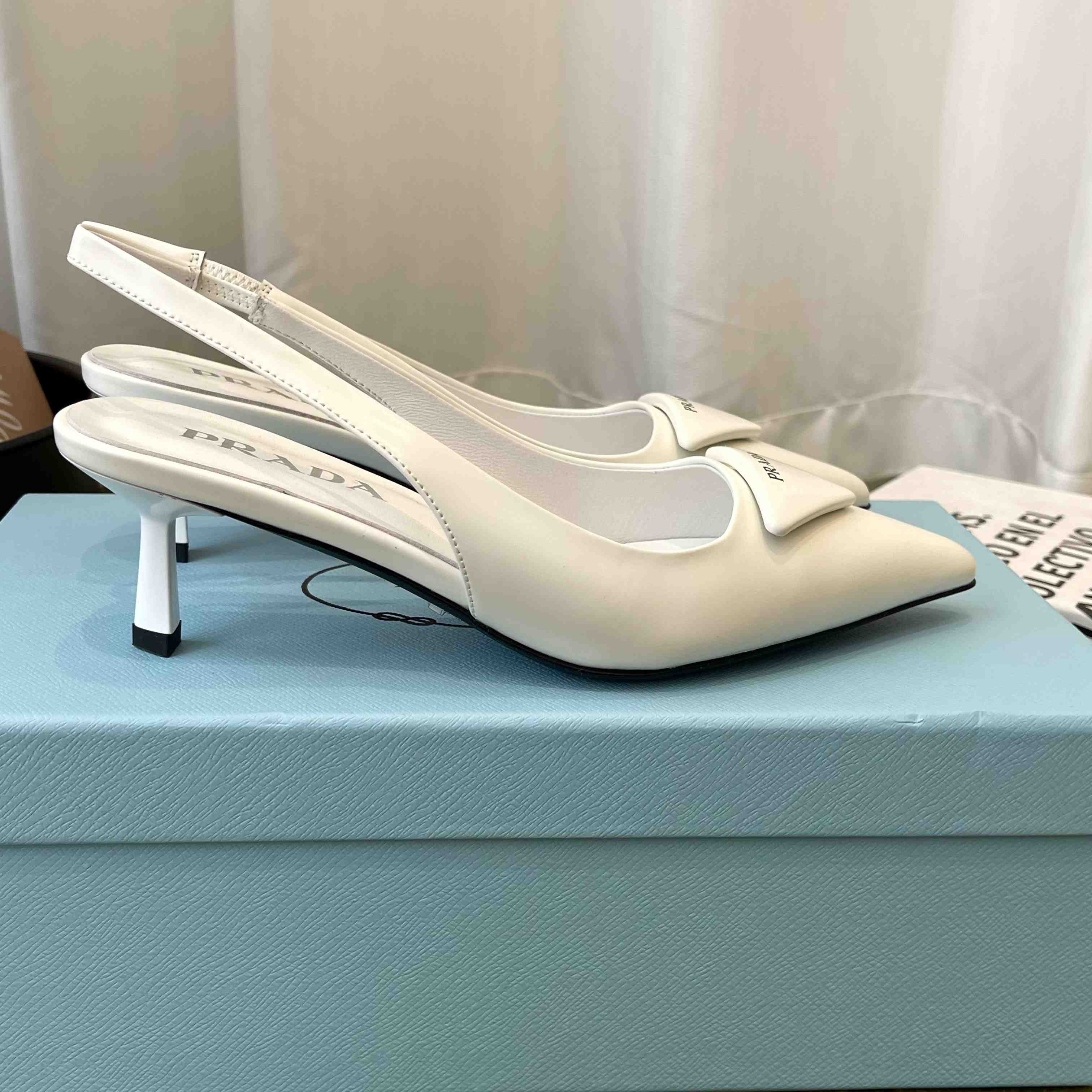 Prada Patent Leather Slingback Pumps - FashionPlug