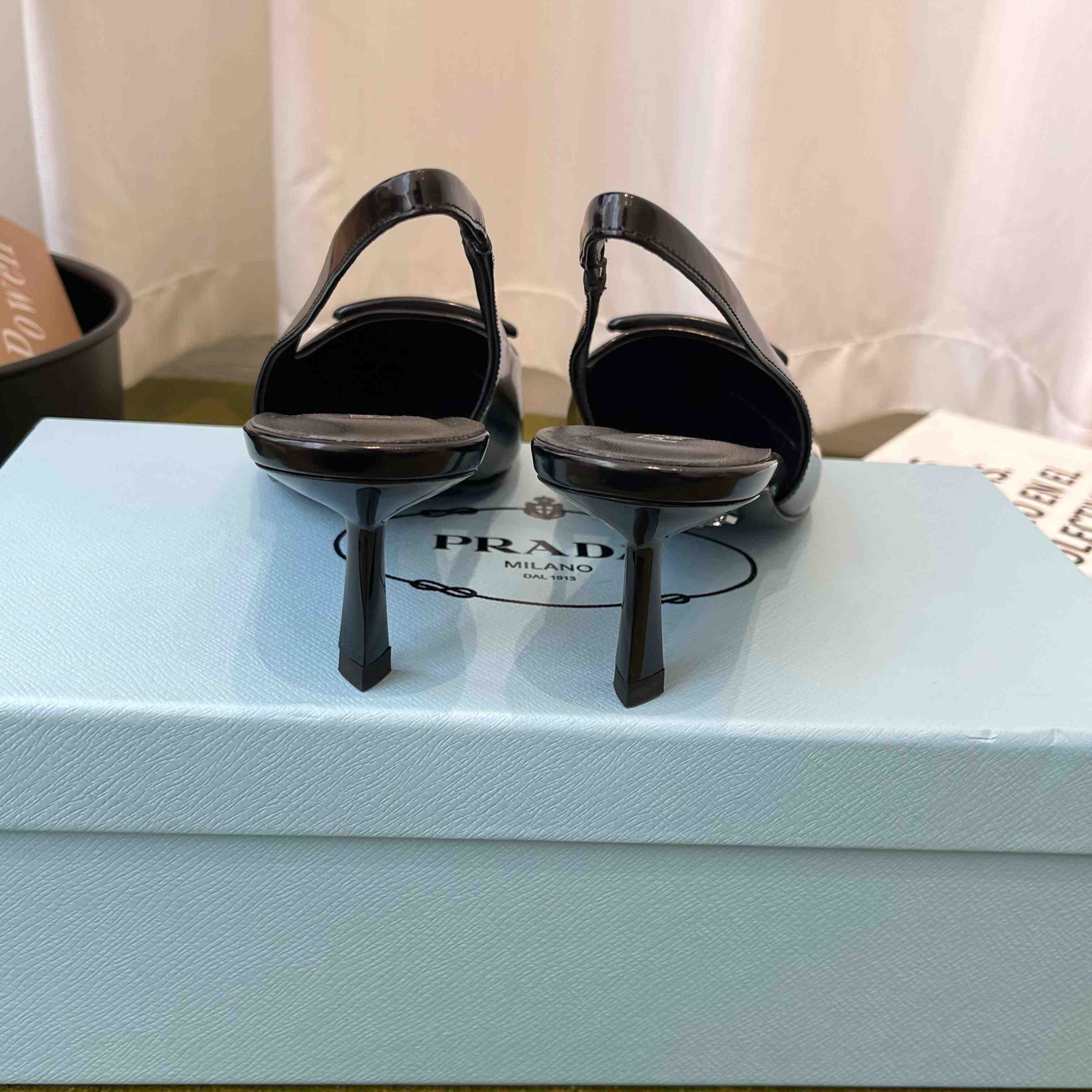 Prada Patent Leather Slingback Pumps - FashionPlug