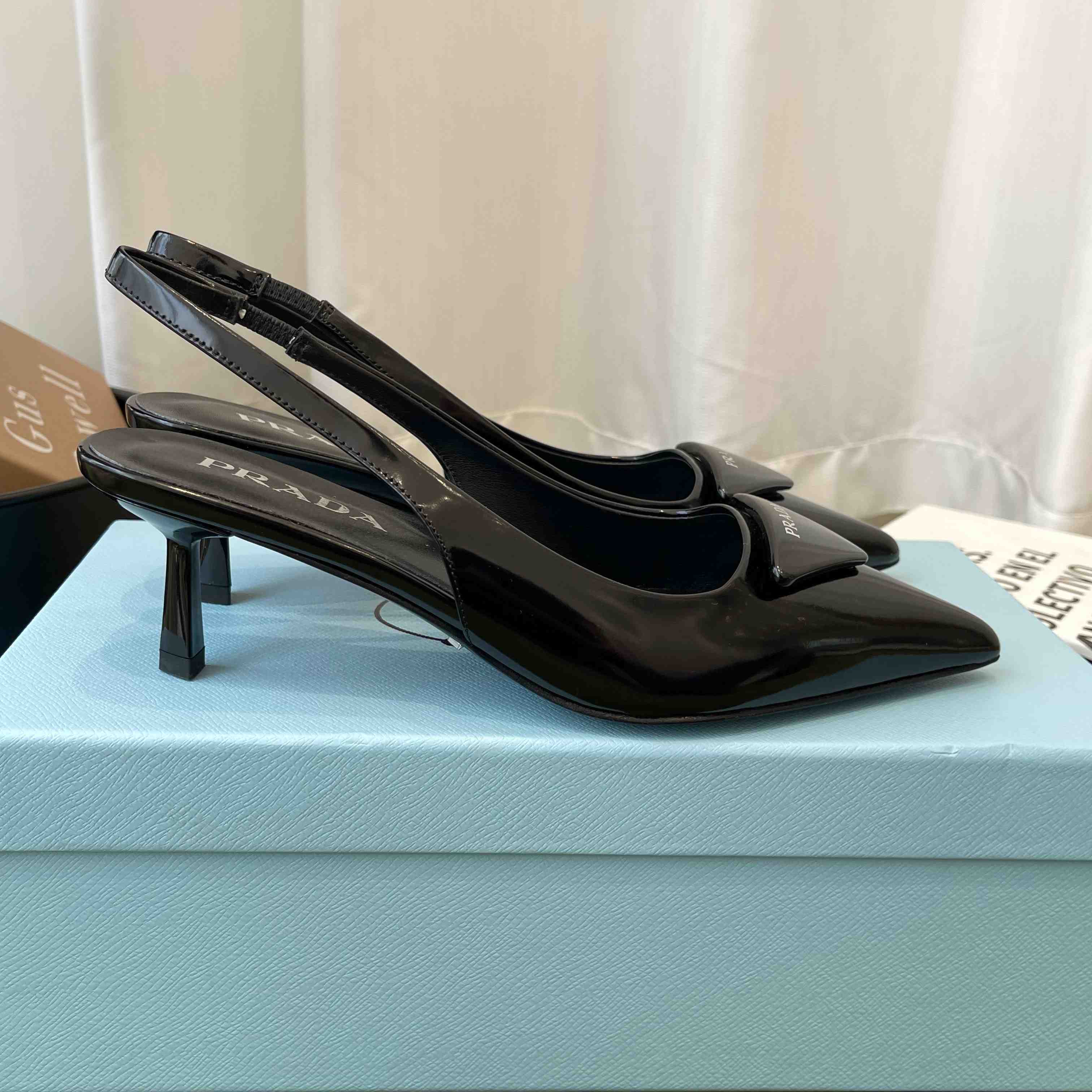Prada Patent Leather Slingback Pumps - FashionPlug