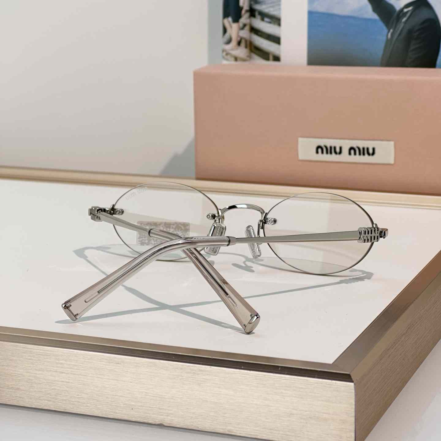 Miu Miu SMUA54S Sunglasses - FashionPlug