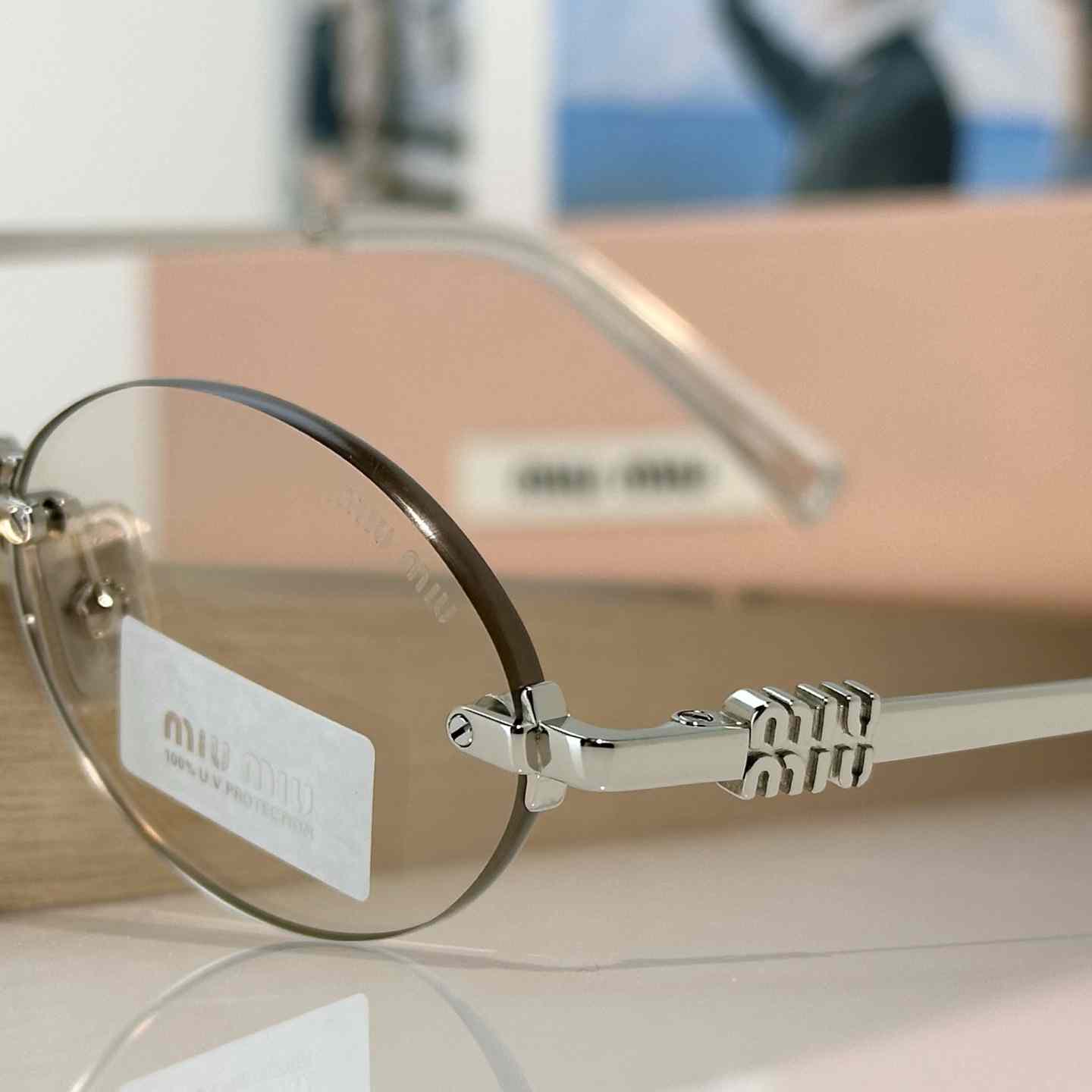 Miu Miu SMUA54S Sunglasses - FashionPlug