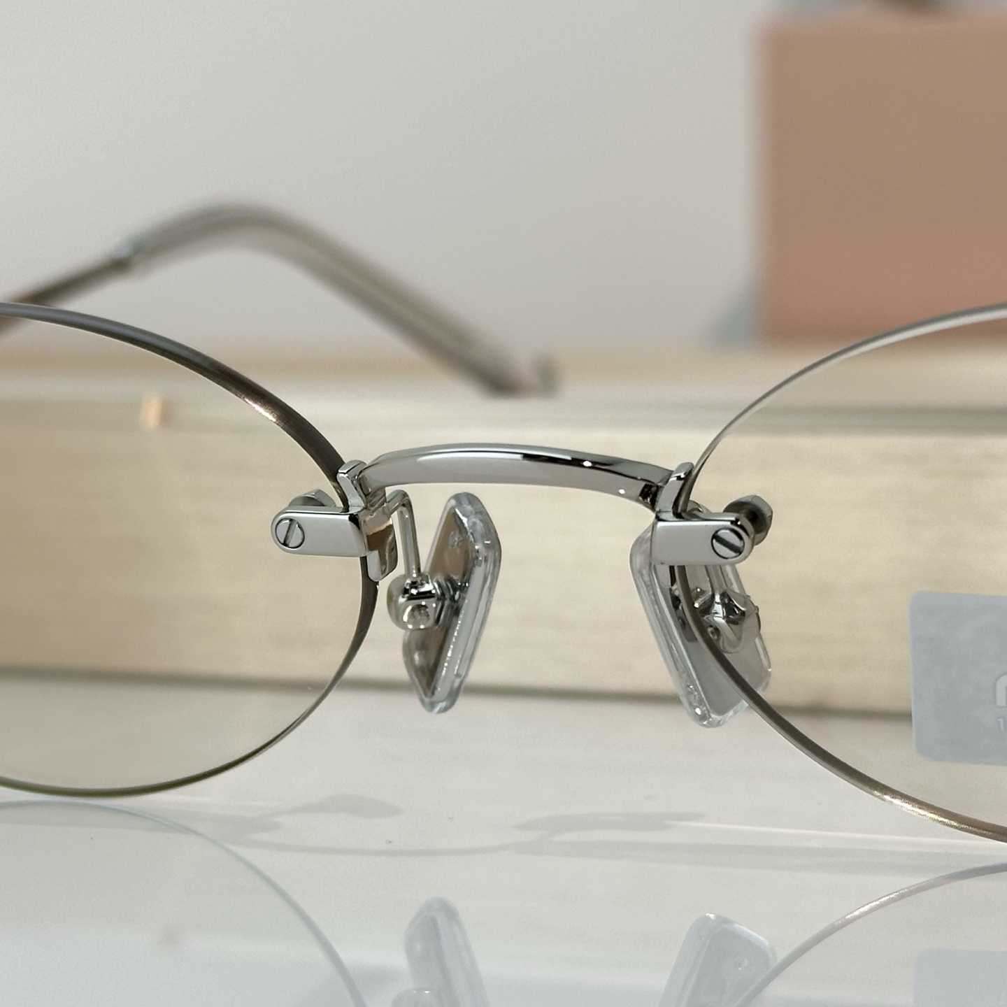 Miu Miu SMUA54S Sunglasses - FashionPlug