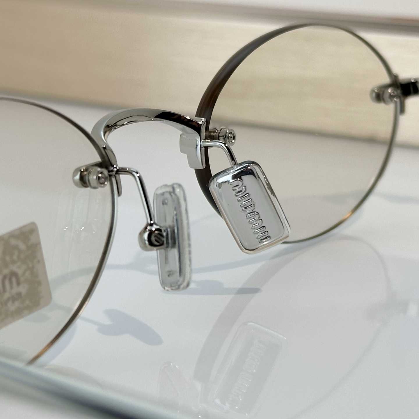 Miu Miu SMUA54S Sunglasses - FashionPlug