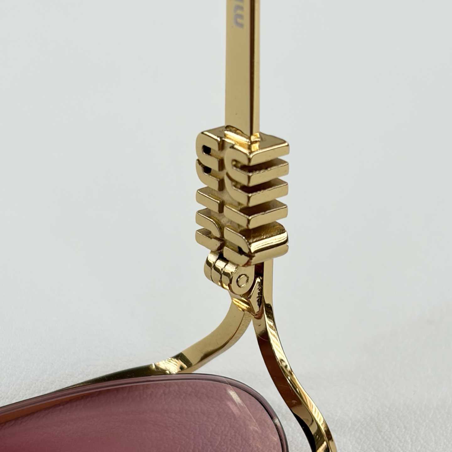 Miu Miu SMU58YSunglasses - FashionPlug