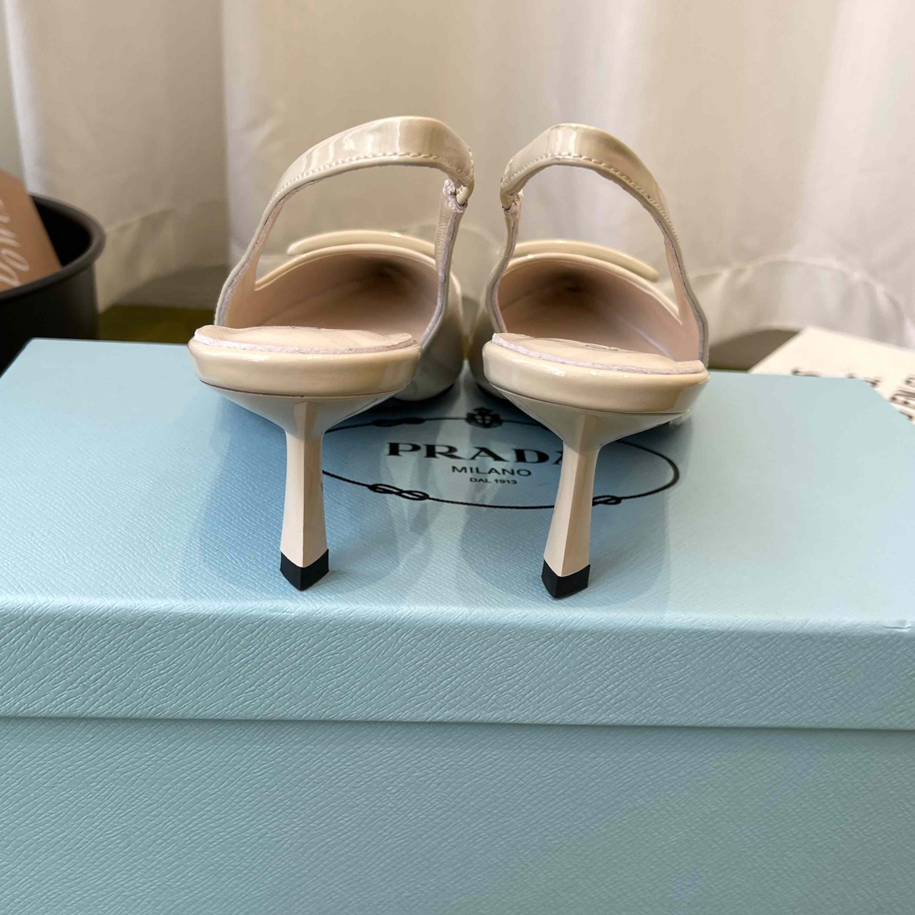 Prada Patent Leather Slingback Pumps - FashionPlug