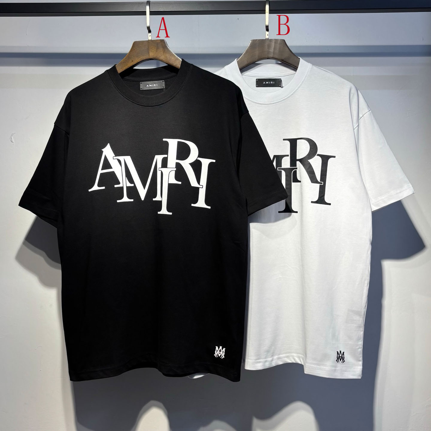 Amiri Staggered Logo Tee - FashionPlug