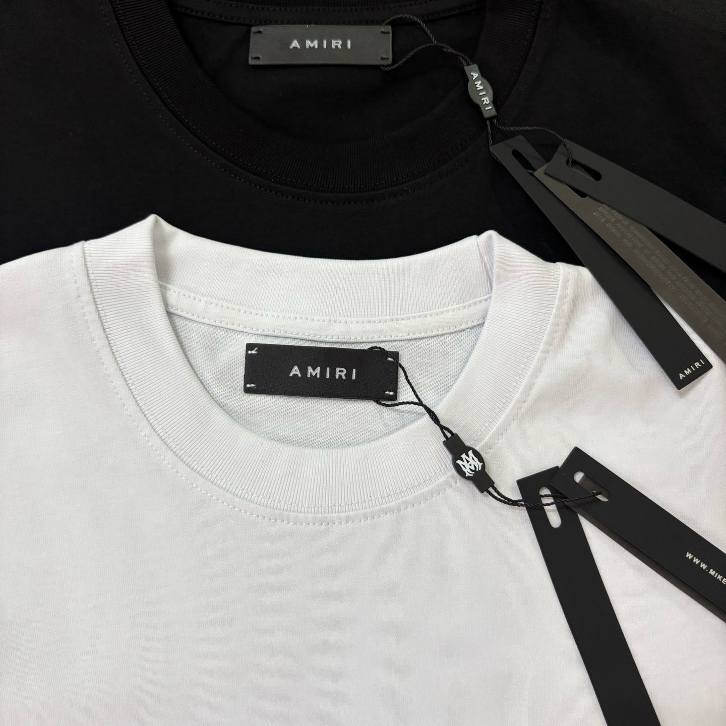 Amiri Staggered Logo Tee - FashionPlug