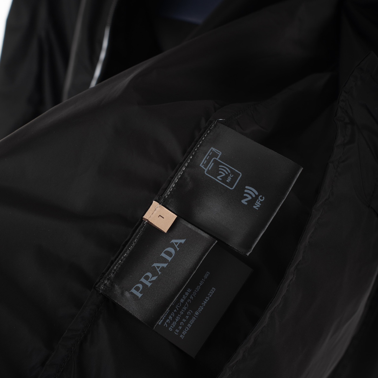 Prada Re-Nylon Hooded Jacket - FashionPlug