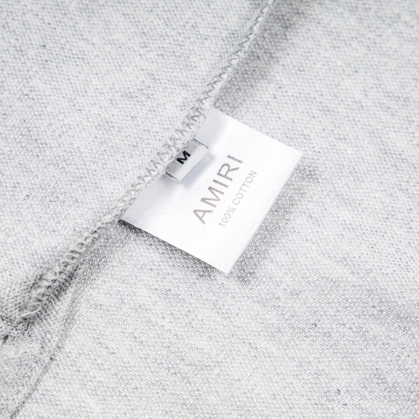 Amiri  Logo Embroidered Polo T-shirt - FashionPlug